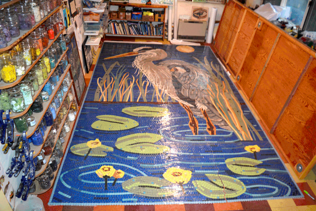 great blue heron mosaic and lily pads